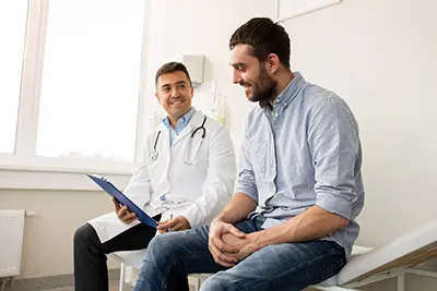 man talking with his doctor